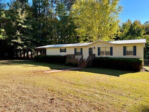 Building Photo - Fully Furnish with a relaxing LAKE access!