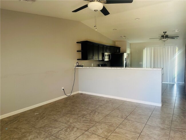 Building Photo - 9927 S Phoenix Dr