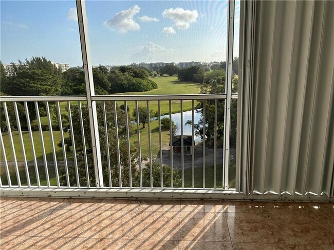 Building Photo - 3300 N Palm Aire Dr