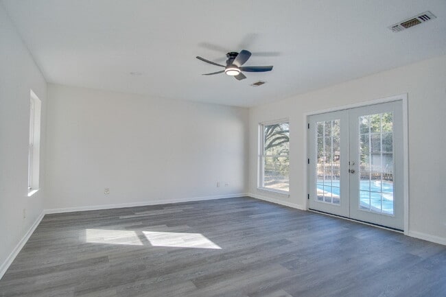 Building Photo - Stunning 4BR/2BA Pensacola Home with Private Pool, Modern Kitchen, Luxury Vinyl Flooring, Fully F...