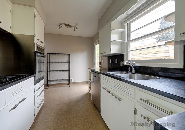 Building Photo - 7017 N Mobile Ave