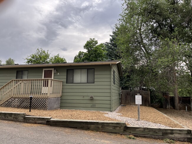 The duplex with front and side yard view - 1228 Maple Street