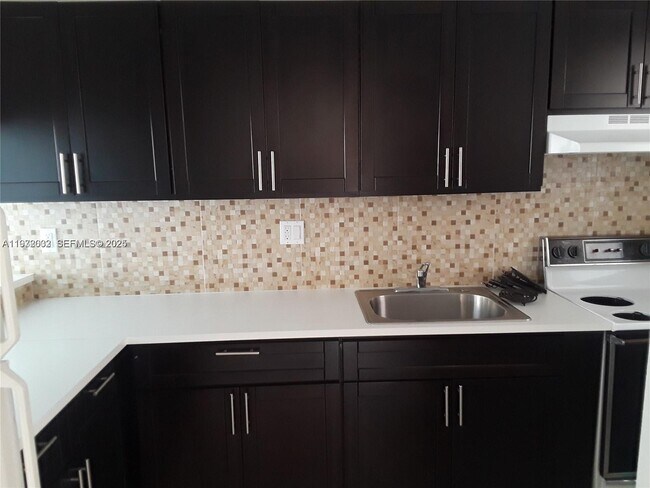 Building Photo - 3675 W 11th Ave