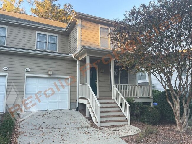 Building Photo - Freshly Painted with New Carpet and Wood F...