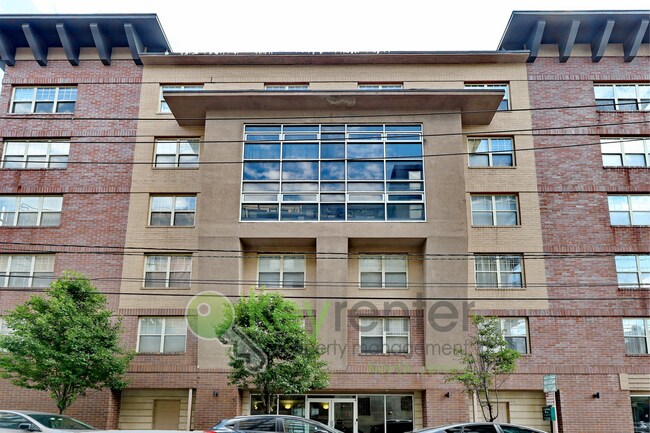 Building Photo - Top-Floor 2BR/2BA Condo with NYC Views + P...
