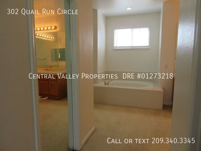 Building Photo - 302 Quail Run Cir