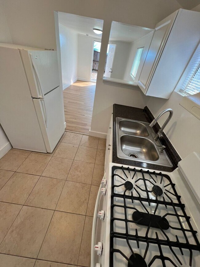 Building Photo - Private Detached House with Fenced Yard and Large Covered Carport