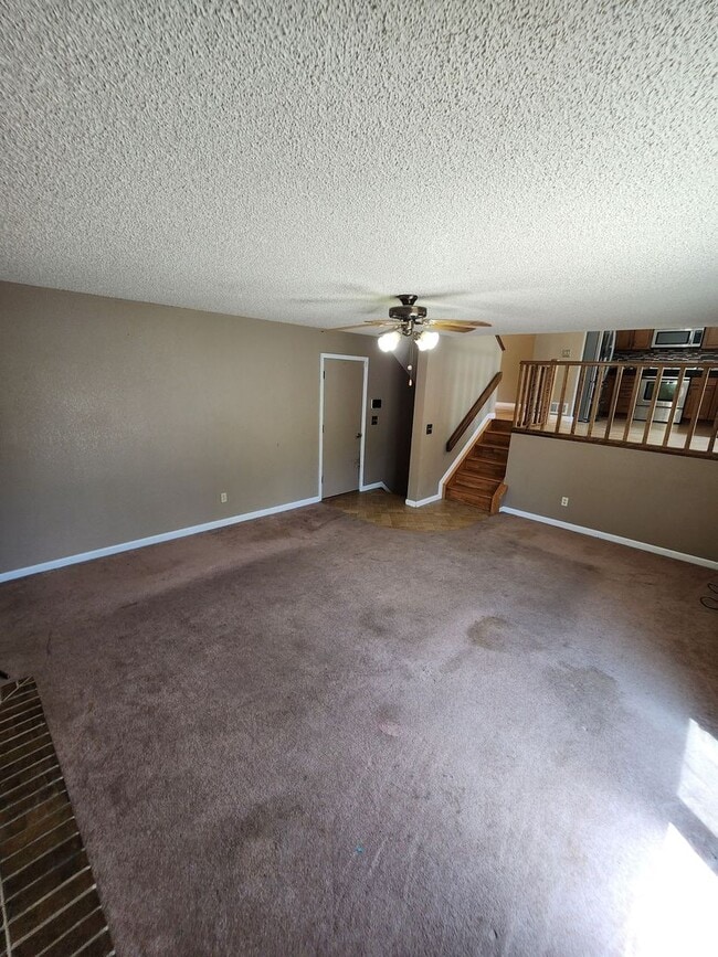 Building Photo - Spacious 4-Bedroom Home with RV Parking in...