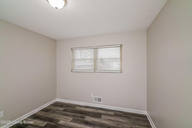 Building Photo - 7709 Mango Dr