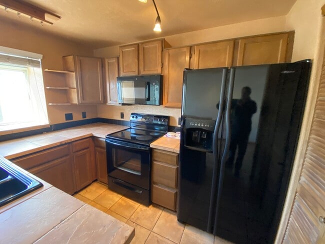 Building Photo - 9606 W Chatfield Ave
