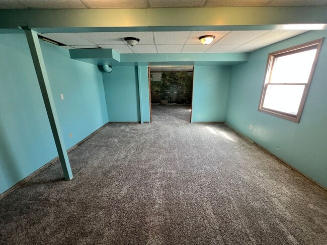 Building Photo - Spacious 3BR Home with 3-Car Garage & Big Backyard