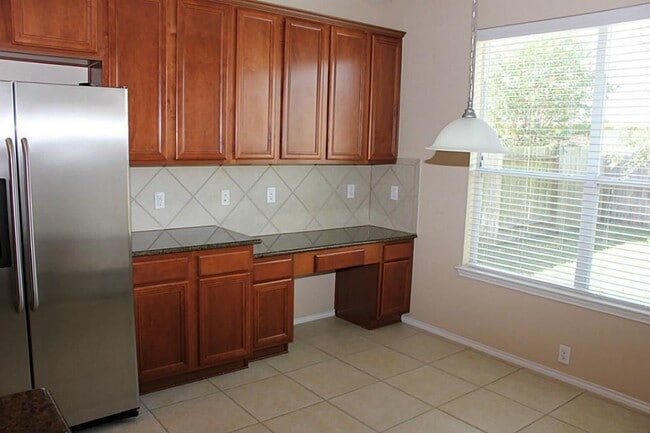 Building Photo - 9615 E Amber Bluff Ln