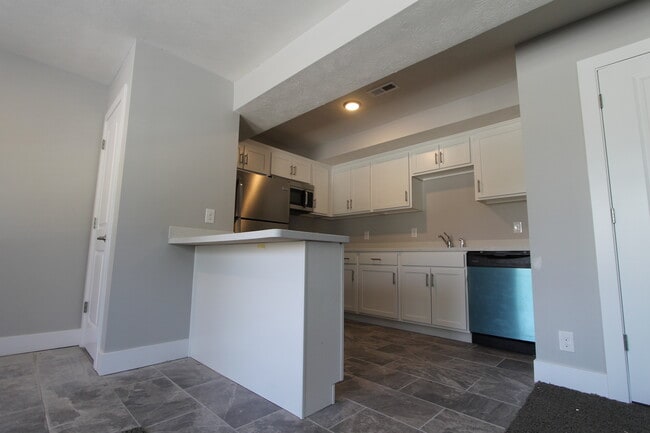 Building Photo - Modern One Bedroom Duplex at the Cottages -- A must-see!.