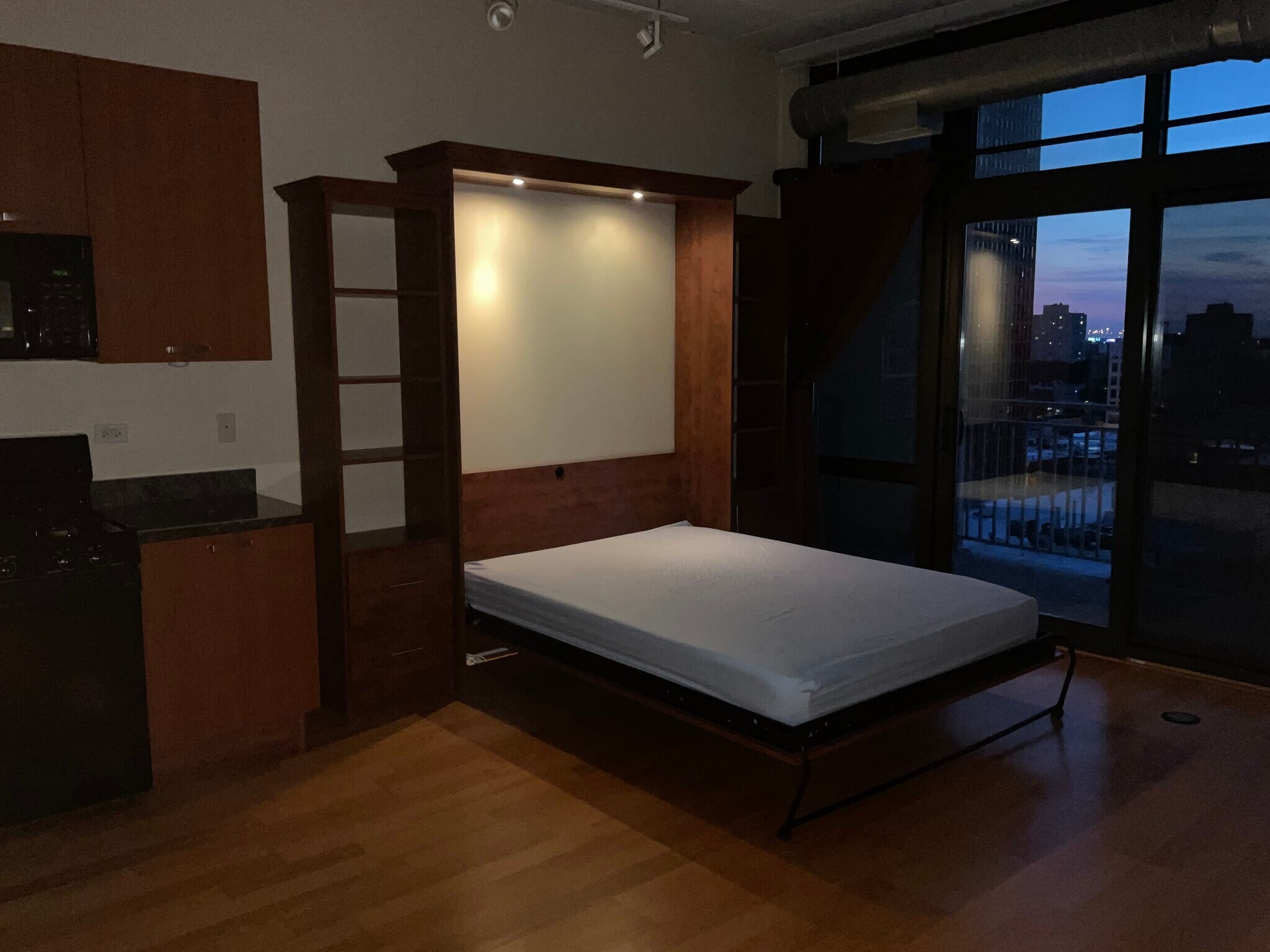 Murphy's Bed open with night light - 212 E Cullerton St