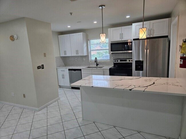 Building Photo - 6380 NW 25th Ct