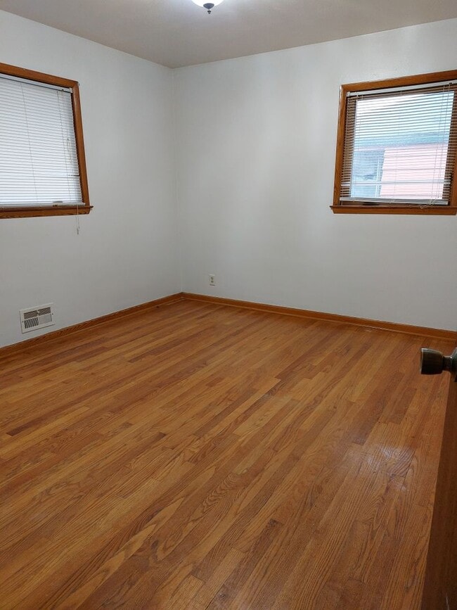 Building Photo - Corner lot with fenced in backyard!