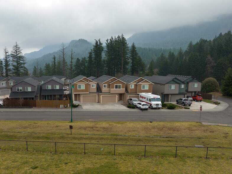 exterior with background - 1295 Windsong Dr