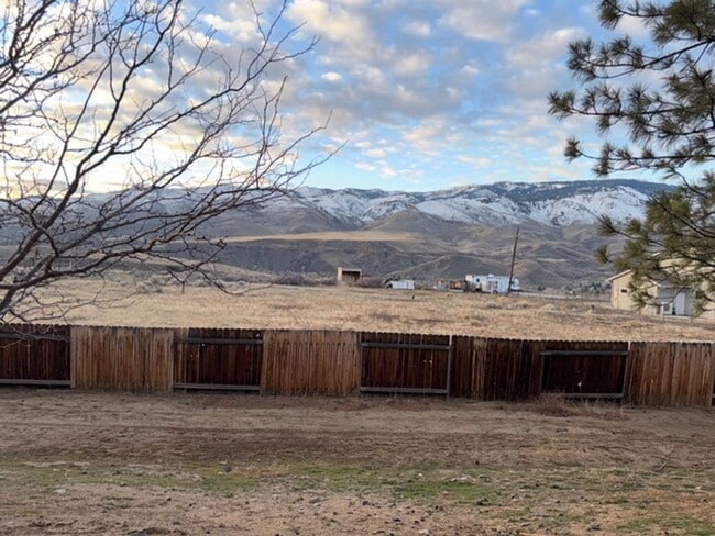 Building Photo - Discover Your Dream Condo with Stunning Mountain Views a 1 Car Garage & Covered carport in NW Ren...