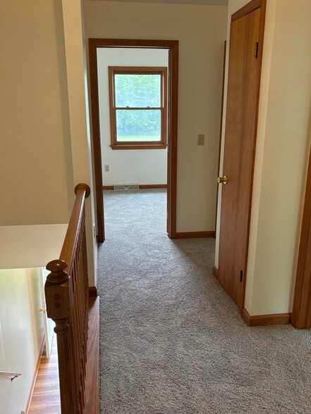 Second floor hallway with closet - 10 Burke Dr