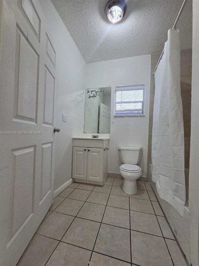 Building Photo - 9801 SW 13th Ct