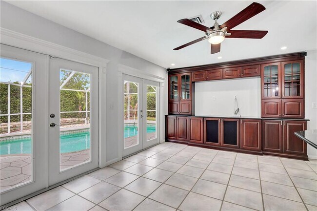 Building Photo - 42nd Terrace Southwest, Naples, FL 34116 -...