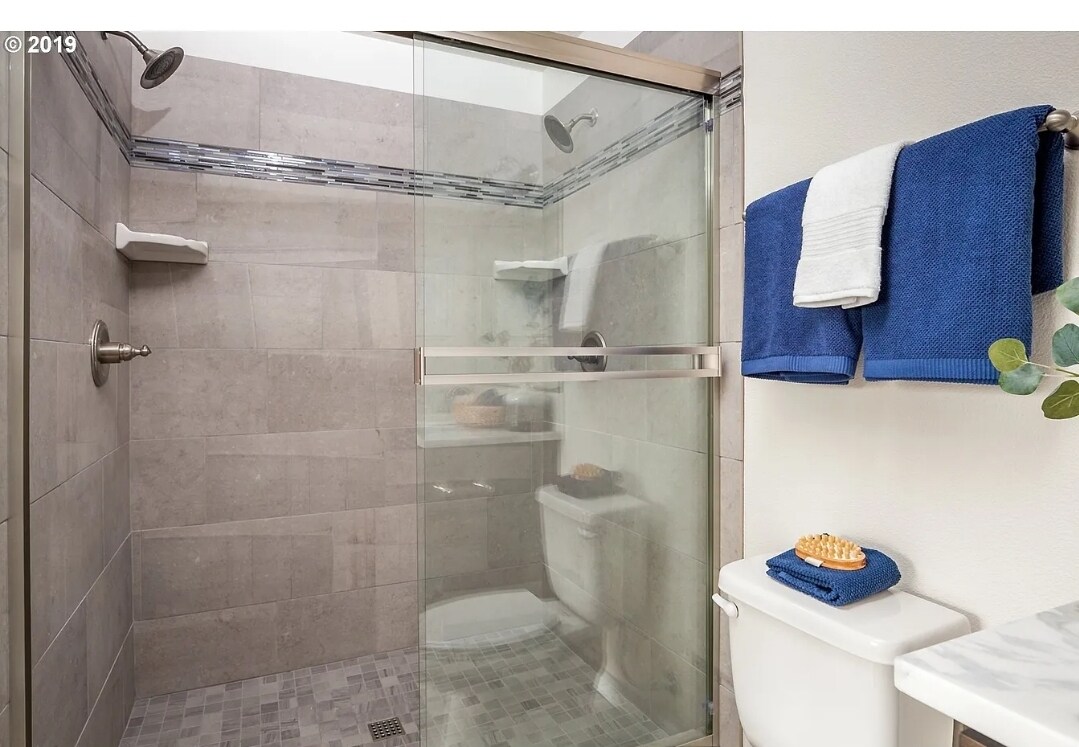 Tile shower with double shower heads - 8814 N Edison St