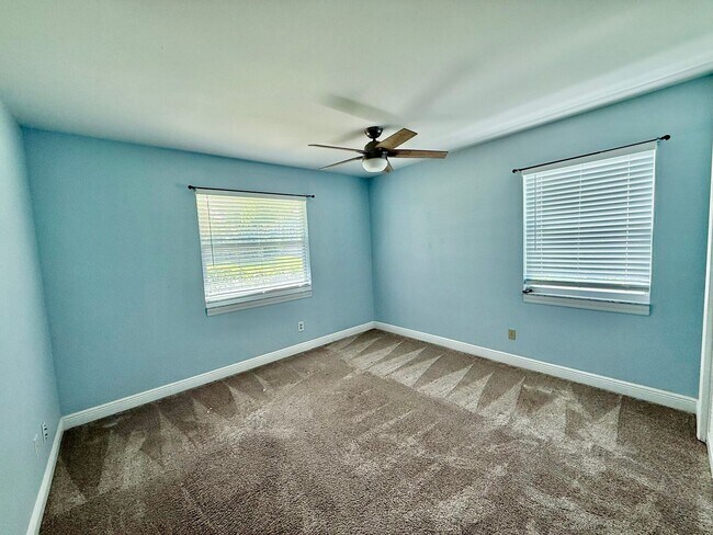 Building Photo - Palm City Home with Dock and Lift