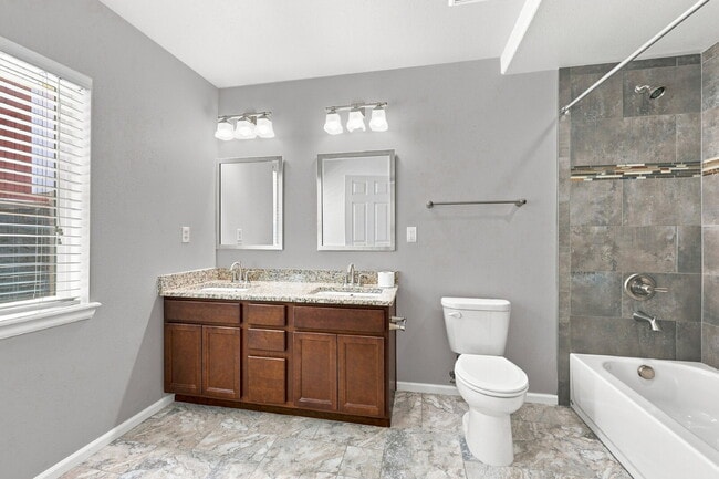 Building Photo - $2,845.95, 6-bed, 3.5-bath located in Colorado Springs with a fenced backyard.