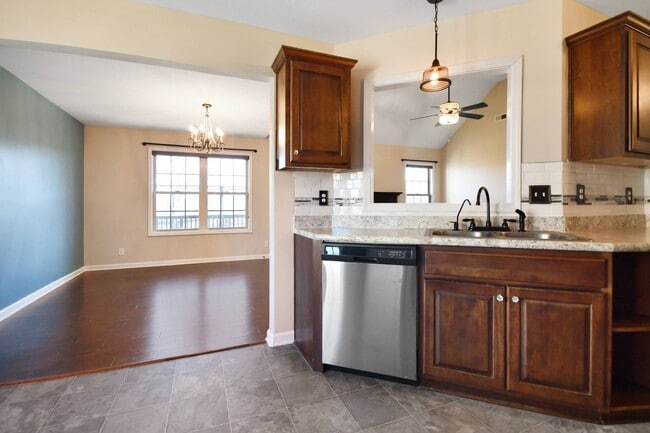 Building Photo - Pet Friendly Three Bedroom with Bonus!