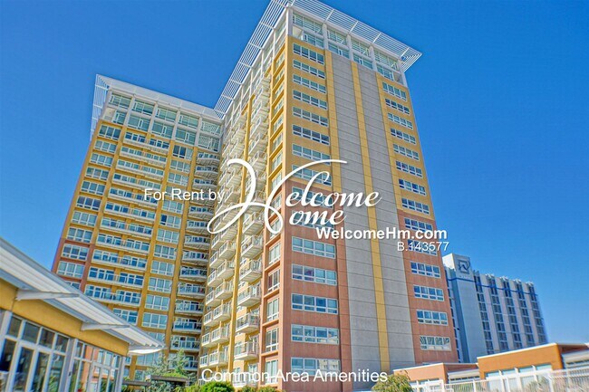 Building Photo - Coming Soon - Downtown High-rise Montage A...
