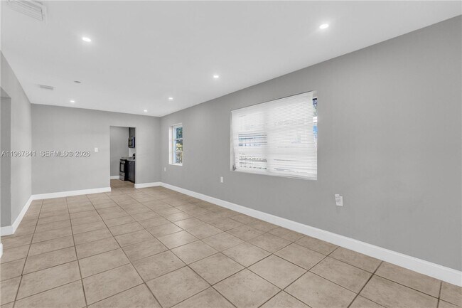 Building Photo - 6940 NW 6th Ct