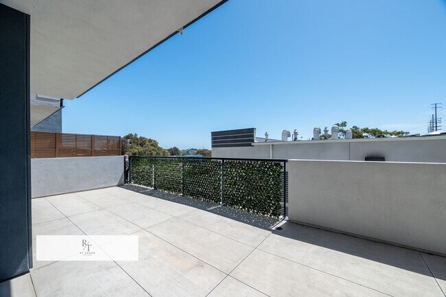 Building Photo - Quiet, Modern 2-Bed Home with Private Pati...