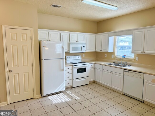 Building Photo - 115 Odyssey Turn NW