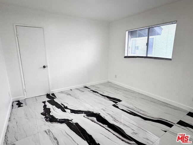 Building Photo - 1630 W 104th St