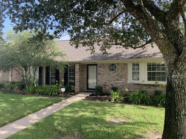 Beautiful front gardens maintained for you. - 7921 Pecan Dr