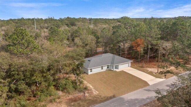 Building Photo - 9461 N Sandree Dr