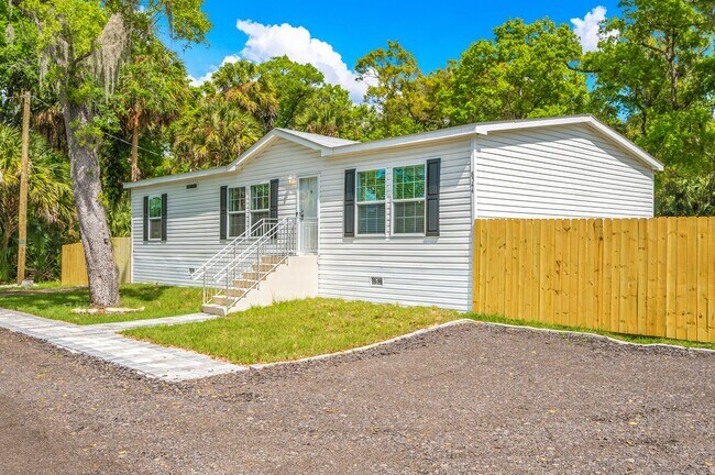 Building Photo - Experience exceptional living at its finest