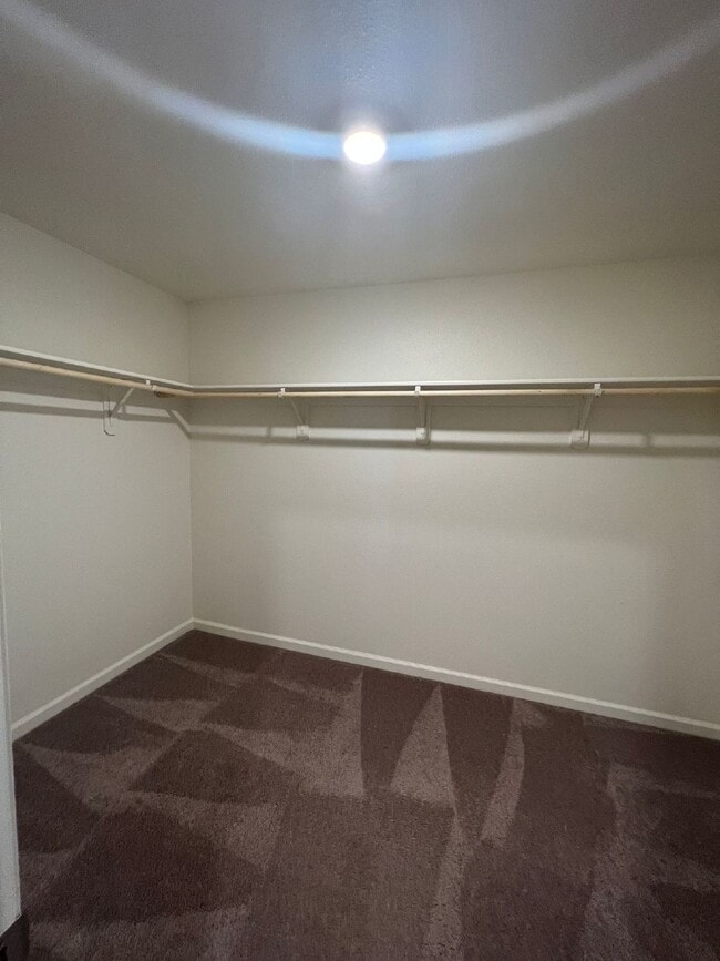 Building Photo - Welcome to modern living in a secure, gated community!