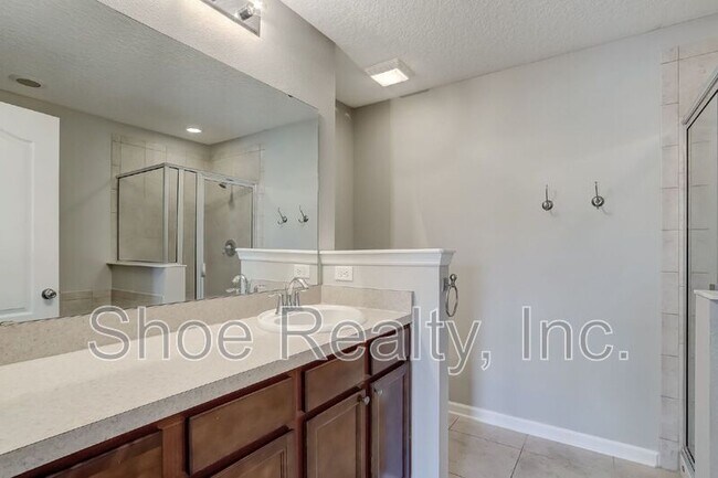 Building Photo - 4220 Plantation Oaks Blvd