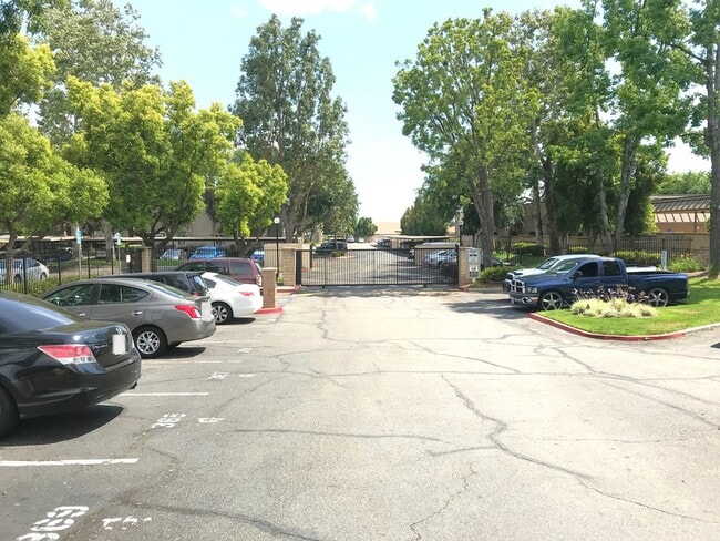 Building Photo - Ground Level 2 Bedroom Condo with Private Patio in Gated Community for Lease