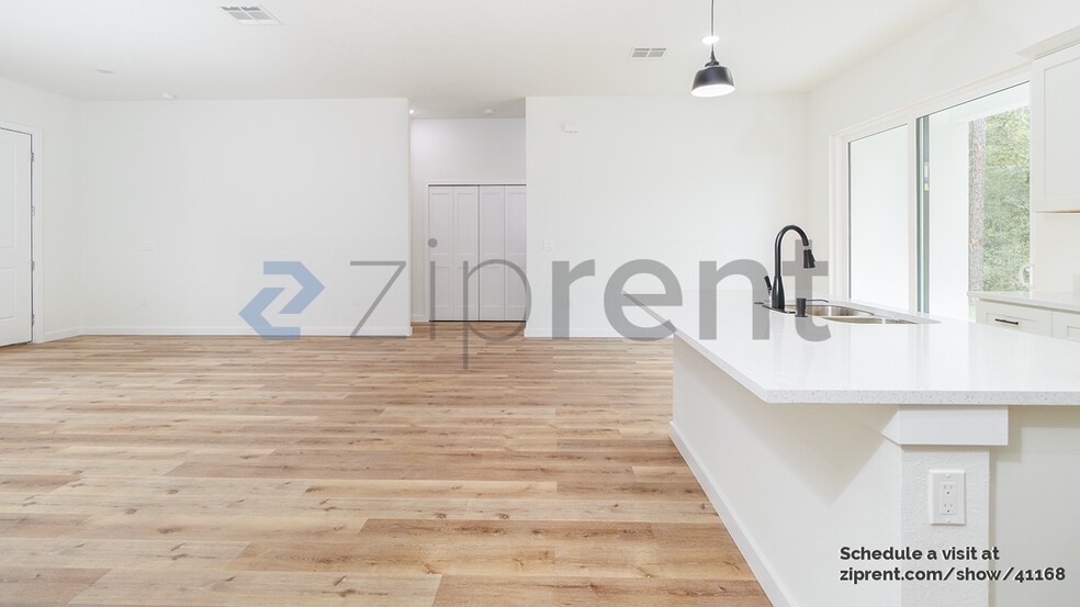 Building Photo - 8202 N Triana Dr
