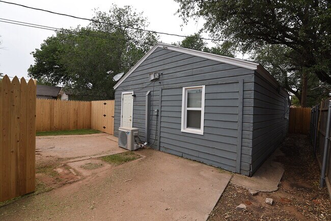 Building Photo - Half Off First Full Month's Rent! Rear Home Nestled In Texas Tech and Downtown Metro Area