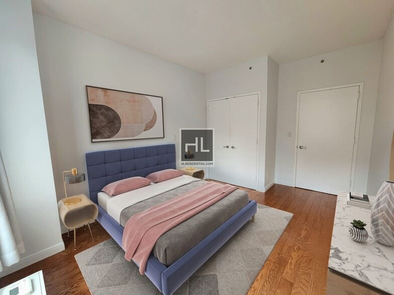 Building Photo - 2BR 2BA w/ Curvy Balcony, In-Unit Laundry, Gym, Roof Deck In Boutique Low-Rise Doorman Building