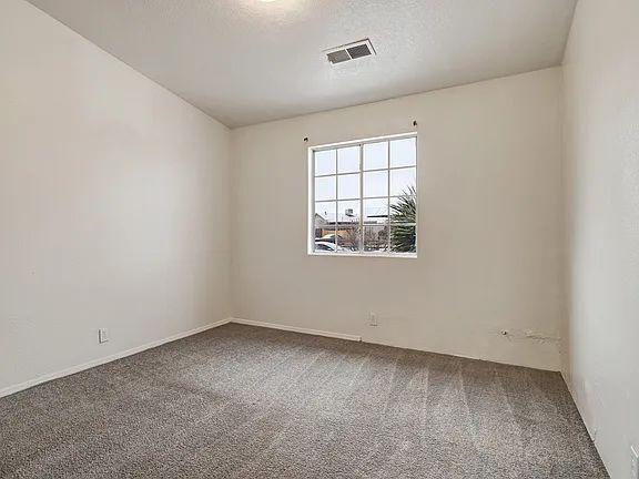 Building Photo - "Spacious 4-Bedroom Gem on Quartz Dr – Your Ideal Albuquerque Retreat!"
