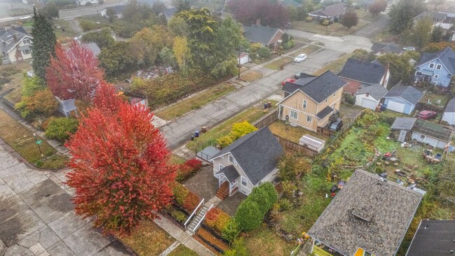 Building Photo - Charming Corner-Lot Tacoma Home with Huge ...