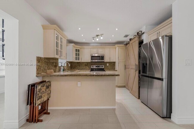 Building Photo - 5850 SW 149th Ave