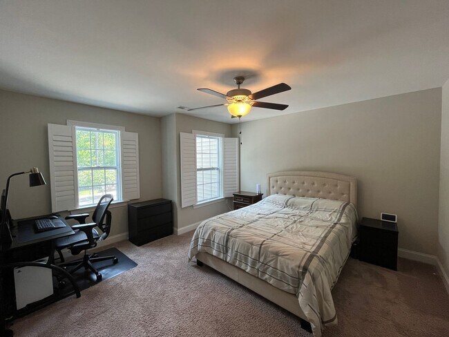 Building Photo - Exceptional 4BD, 2.5BA Cary Townhome with 2-Car Garage, Bonus 2nd Floor Living Space, and Private...