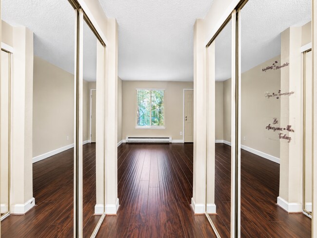 Building Photo - Modern Wooded Condo with Upgraded Kitchen & Private Deck