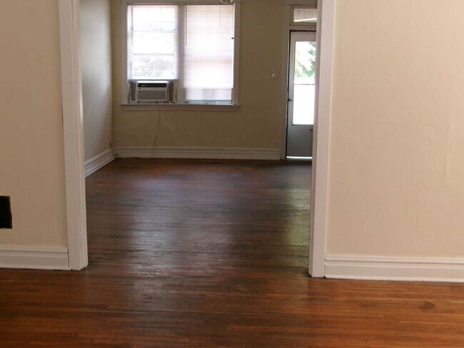 Building Photo - ** MOVE IN SPECIAL** First-Floor Unit with Hardwood Floors & Spacious Living Areas