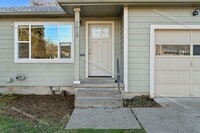 Building Photo - Cozy 2BR Corner Lot Home with Garage, Shed & Fenced Yard!